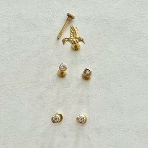 Set of 5 pierced stud 14k YG earrings. 4 mini diamond rounds, one hummingbird.